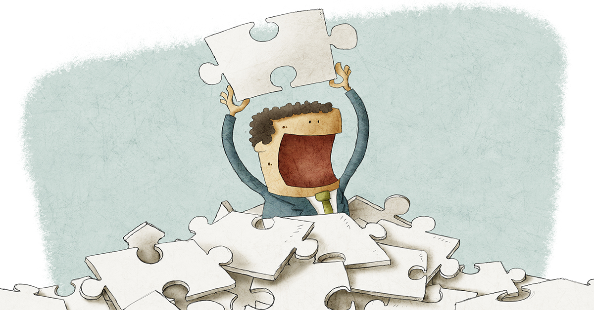 man_finds_puzzle_pice_in_pile_no_logo